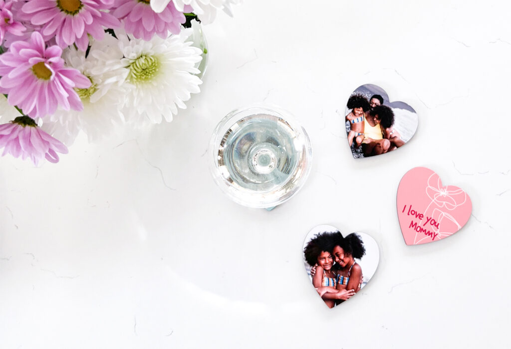 Mother's Day heart-shaped photo coasters with pictures of daughters and I love you mommy sublimated.
