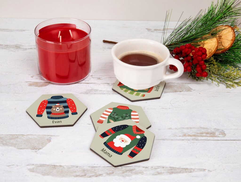 Holiday themed coasters with sweaters and names. 