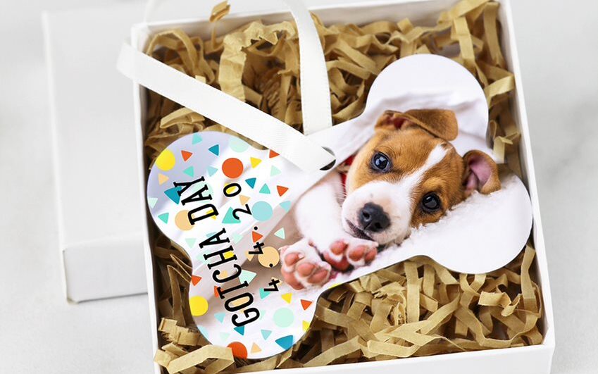 Unisub bone-shaped ornament with a Gotcha Day sublimation design and a photo of a new puppy. 